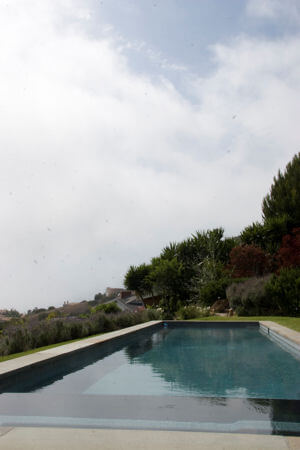 Relaxing pool side at Cliffside Malibu’s Alcohol Rehab Center