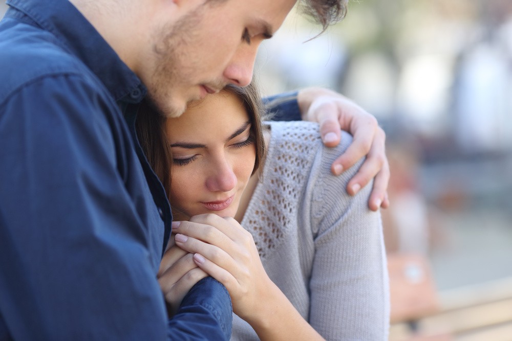 The Role of Family in Alcohol or Substance Addiction Treatment, two people hugging at treatment.