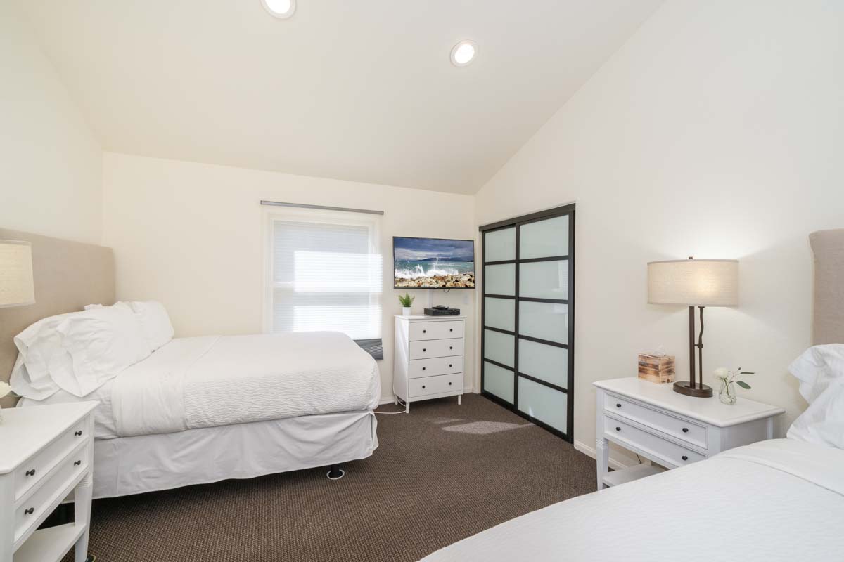 Bedroom with two beds in Recovery Malibu, a residential treatment center in Malibu, California.