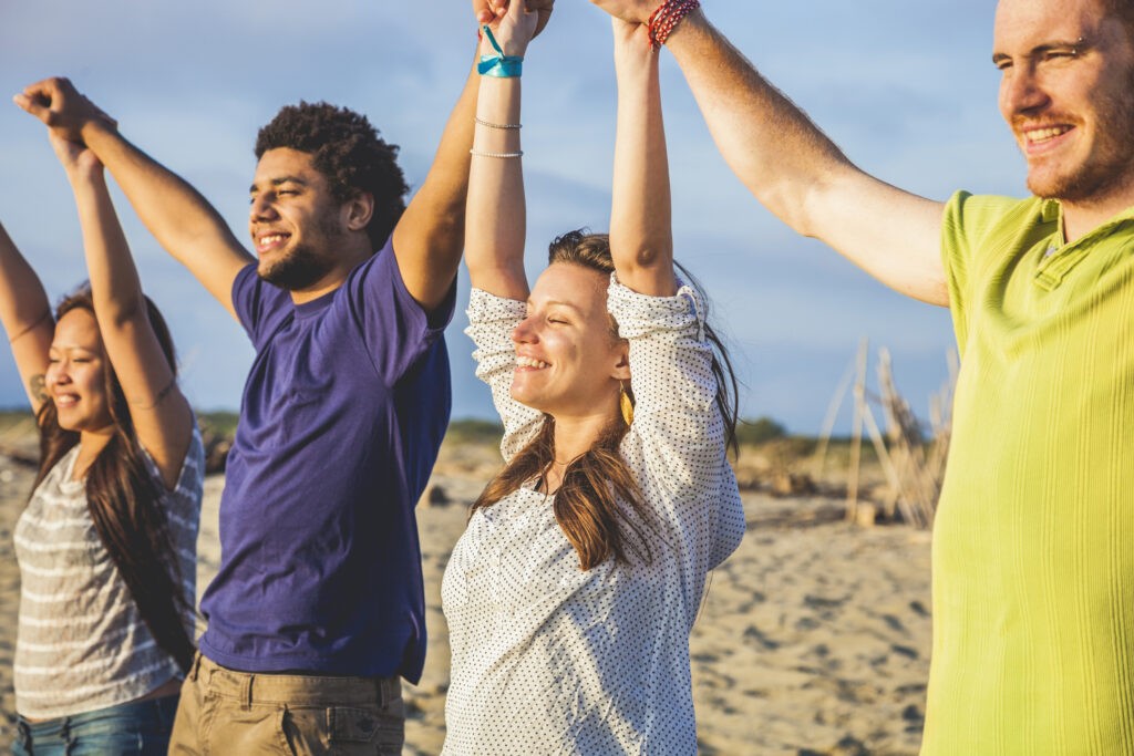 A group therapy session on the beach.